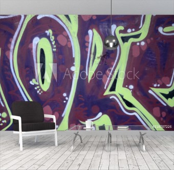 Image de Fragment of graffiti drawings The old wall decorated with paint stains in the style of street art culture Colored background texture